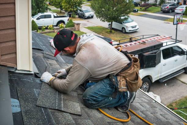 Professional Roofing technician working in Central City, IL